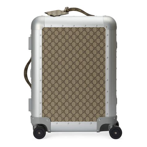 gucci for him and her|Gucci luggage.